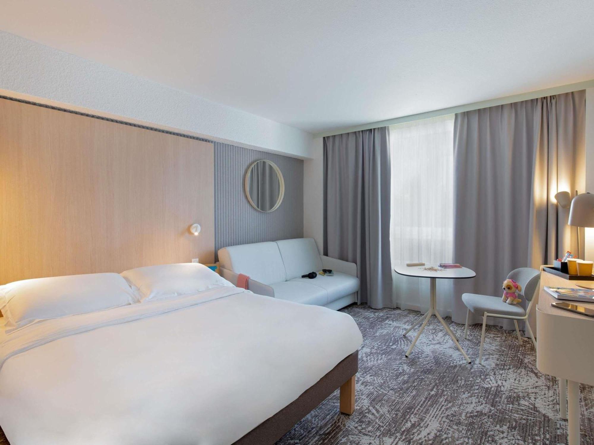 Family Room with One Double Bed and One Sofa (2 persons)